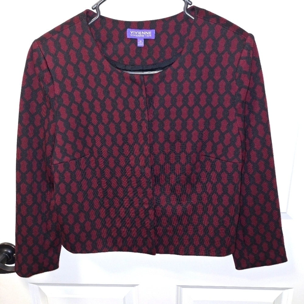 A Vivienne Tam cropped cardigan full button sweater in a size 10.
